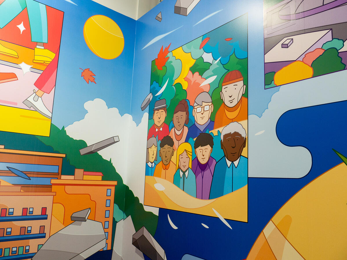 Une murale imprimée de l'artiste Lucas Saenger, représentant des bâtiments de Montréal ainsi que sa canopée.